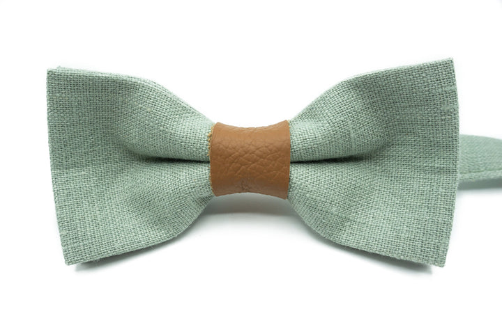 Single sage green bow tie with a leather center, ideal for formal attire.