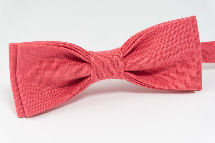 Close-up of Coral Wedding Bow Tie showing fabric texture and color